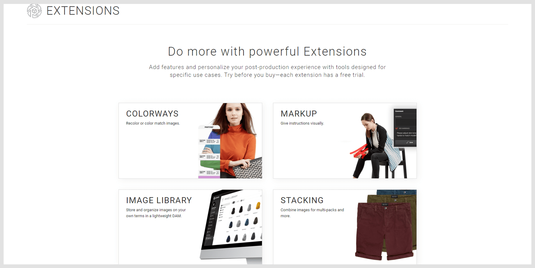 New Extension Store. New Pricing. Same Powerful Extensions. Two people sitting at a computer pointing at the screen.